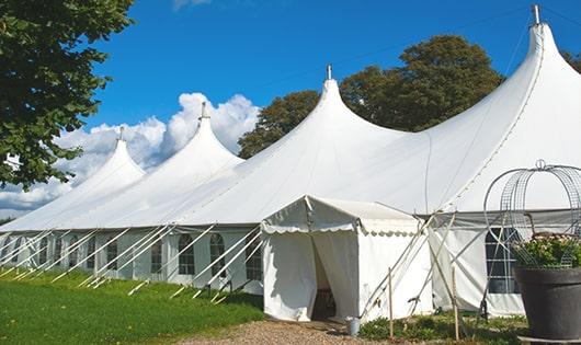 a line of portable restrooms in a shaded area, offering a comfortable experience for users in Maple Shade NJ